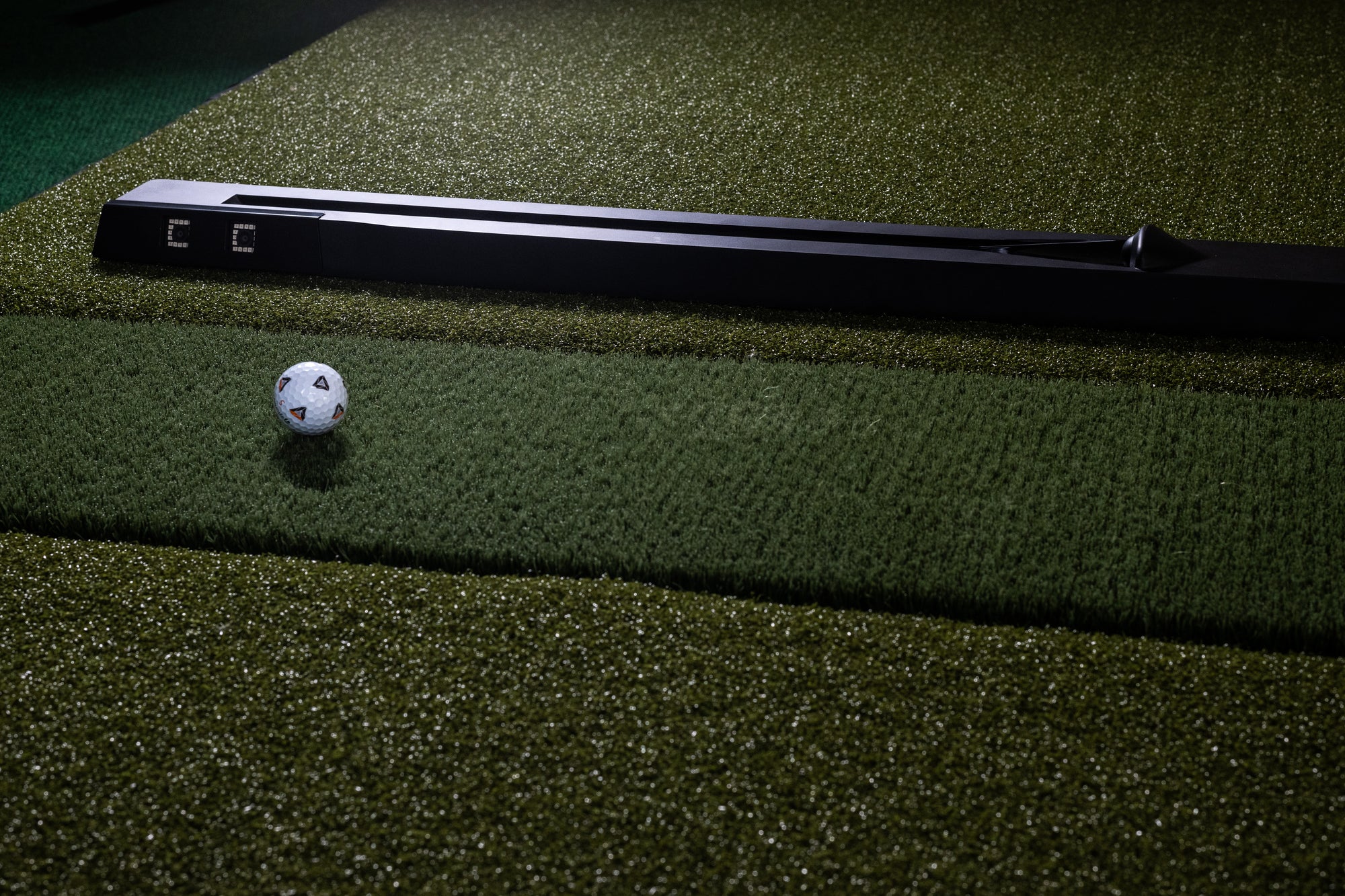 OpenLaunch Nova in a golf simulator setup
