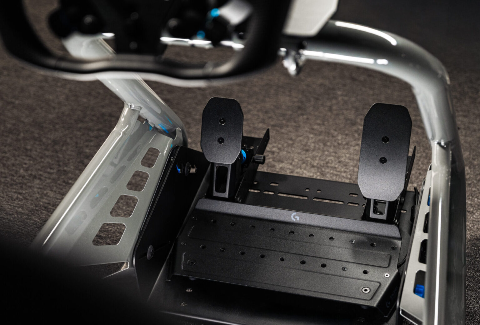 Logitech RS load-cell pedals installed in a racing cockpit