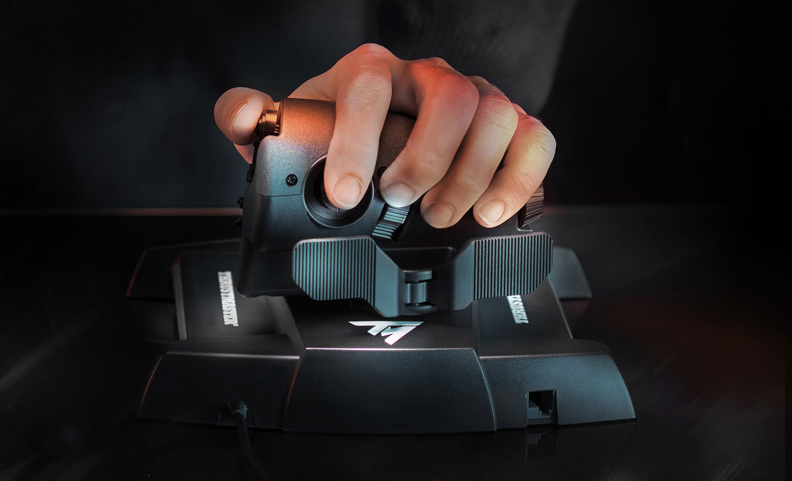 Official real-person hand using the Thrustmaster TWCS throttle in an installed simulator setup