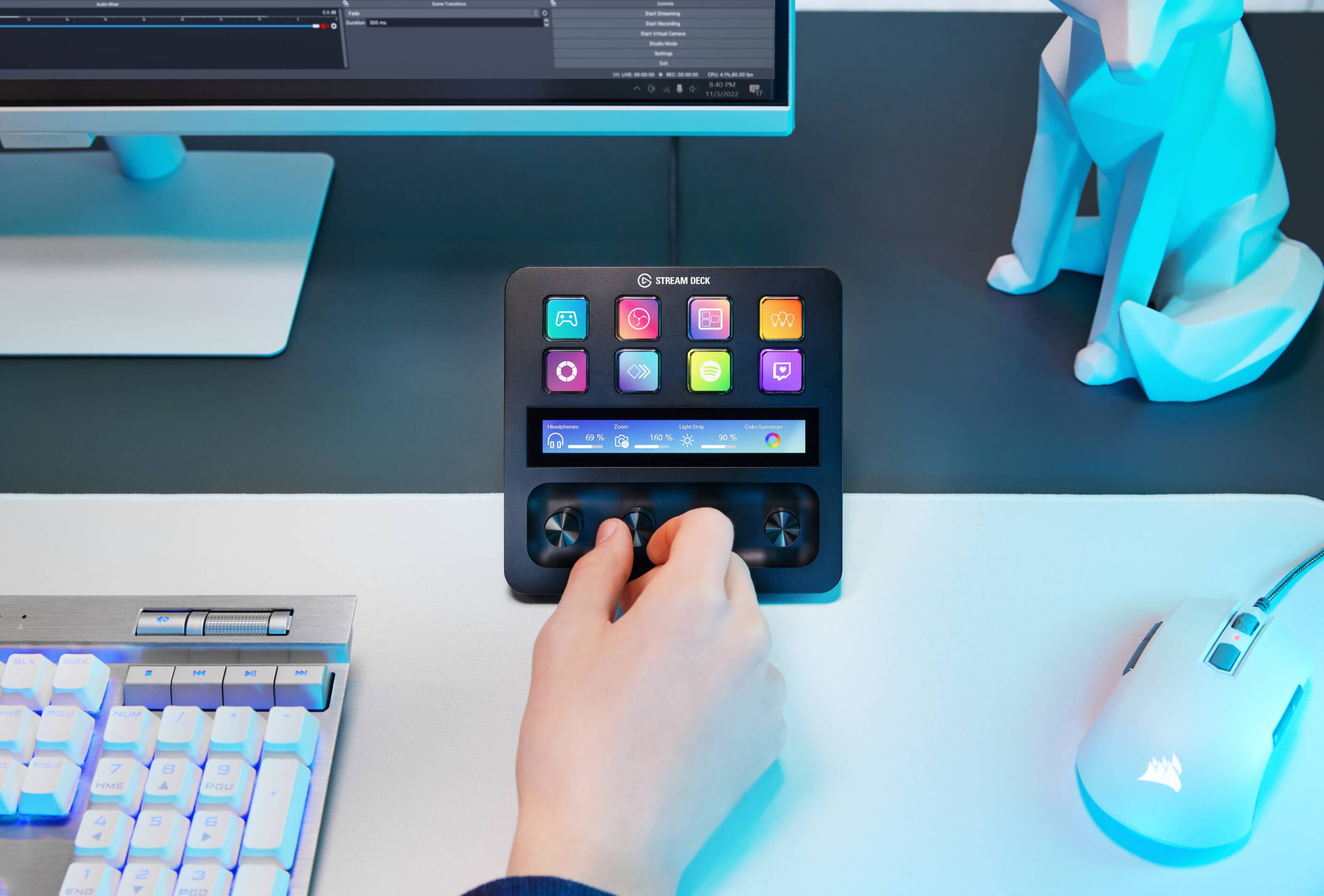 Real user using Elgato Stream Deck Plus dials and keys at a desk